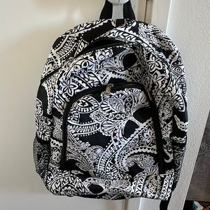 Navy blue and white flower pattern backpack